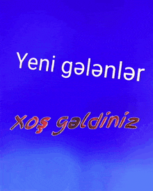 a blue background with the words yeni galanlar and xos galdiniz