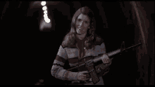 Carrie Fisher Blues Brothers GIF - Carrie Fisher Blues Brothers Submachine Gun GIFs