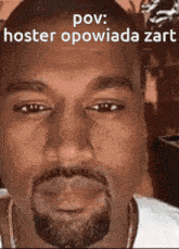 a close up of a man 's face with a beard and the words pov hoster opowiada zar