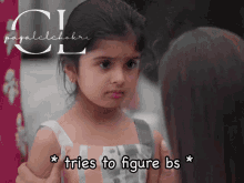 a little girl is standing next to a woman with the words tries to figure bs above her