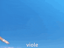 a girl in a school uniform is playing a red guitar with the word viole written on it