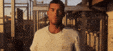 a man wearing a white t-shirt that says florida marine corps