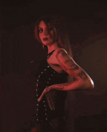 a woman with a tattoo on her arm that says ' i love you ' on it