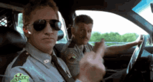 Super Troopers Cops GIF - Super Troopers Cops Middle Finger GIFs
