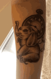 tattoo son elephant clock