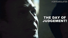 a close up of a man 's face with the words " the day of judgement " on the bottom