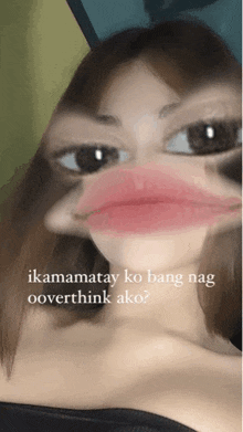 a woman is making a duck face with the words " ikamatay ko bang nag ooverthink ako "