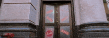 a store with a sale sign on the door