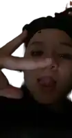 a person making a peace sign with their finger on their nose