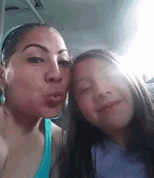 Mother And Daughter Kisses GIF - Mother And Daughter Kisses GIFs