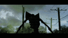a silhouette of a robot is standing in front of telephone poles