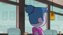 a cartoon of a girl sitting at a table with a bun on her head