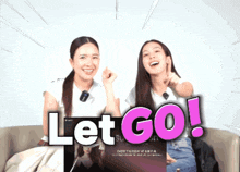 two women are sitting next to each other and the words let go are visible