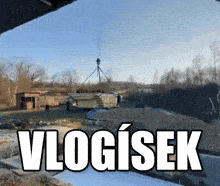 a picture of a crane lifting a building with the word vlogishek written below it