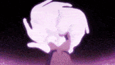 a person is holding a pink object in their hands .