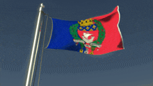 a red white and blue flag with a coat of arms