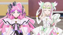 two anime girls are standing next to each other and one has a heart on her chest
