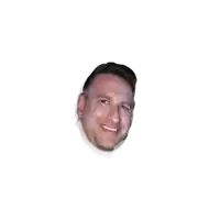 a close up of a man 's face with a slight smile on his face