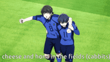 two soccer players on a field with the words cheese and hon in the fields
