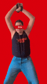 a man wearing a tank top that says female wolf is dancing