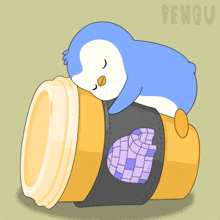a penguin is sleeping on top of a coffee cup with the word pengu on the bottom