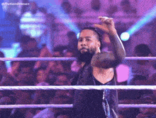 a man in a wrestling ring with the hashtag thekamdreesen on the bottom