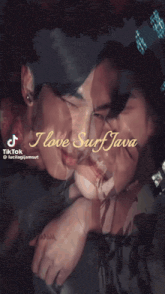 a man and a woman are hugging with the words i love surf java on the bottom