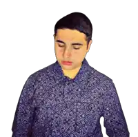 a man with his eyes closed wearing a blue shirt with a floral pattern