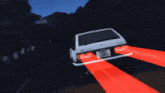 a trueno car is driving down a dark road