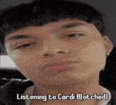 a close up of a person 's face with the words listening to cardi b written on it .