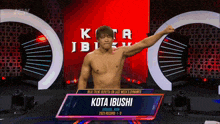 a man without a shirt is standing in front of a sign that says kota ibrushi