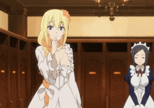 a girl in a white dress stands next to a maid