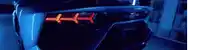 a close up of a car 's tail light that says ' ferrari ' on it