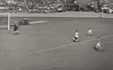 a black and white photo of a soccer game with the letters ndr on the bottom
