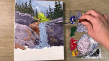 a painting of a waterfall is being made in the animatica