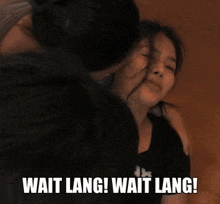 a woman with the number 98 on her shirt is being tickled
