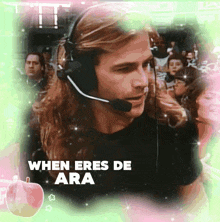a man wearing headphones with the words when eres de ara written below him