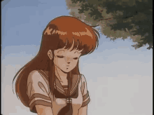 a cartoon girl with long brown hair is standing in front of a tree .
