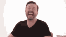 Ricky Gervais Laughing GIF - Ricky Gervais Laughing GIFs