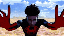 a man in a spider man costume is making a stop sign
