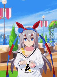 a girl wearing a white shirt that says umai