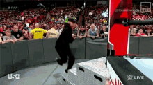 a wrestling match is being broadcasted live on usa