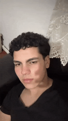 a young man with a red spot on his face