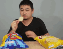 Andre Santi Eat GIF - Andre Santi Eat Potato Chip Taste GIFs