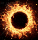 a circle of fire is surrounding a black hole