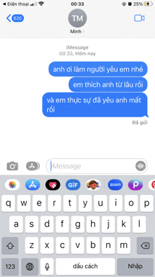 a phone screen shows a text message from tm