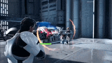a video game is being played on a computer and a person is holding a gun in a room .