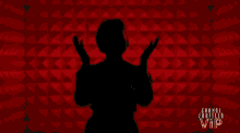 a woman in a black sequined top is smiling in front of a vip logo