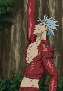 a man with blue hair and a red jacket stands in front of trees