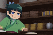 a girl in a green kimono is standing in front of a shelf full of boxes